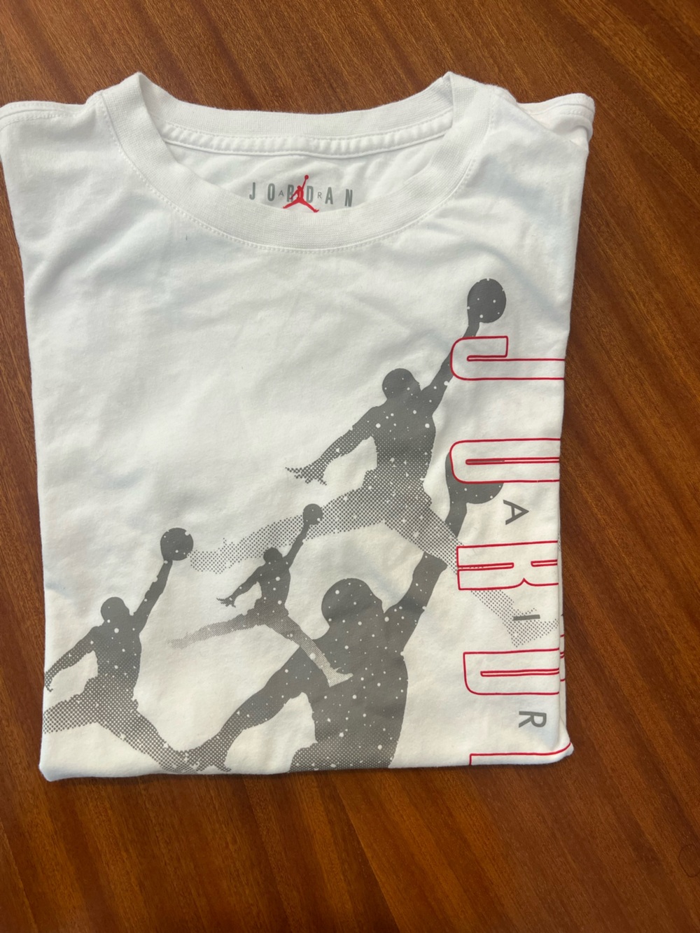 Jordan White Short-Sleeve Tee with Gray Player Silhouettes and Red Logo
